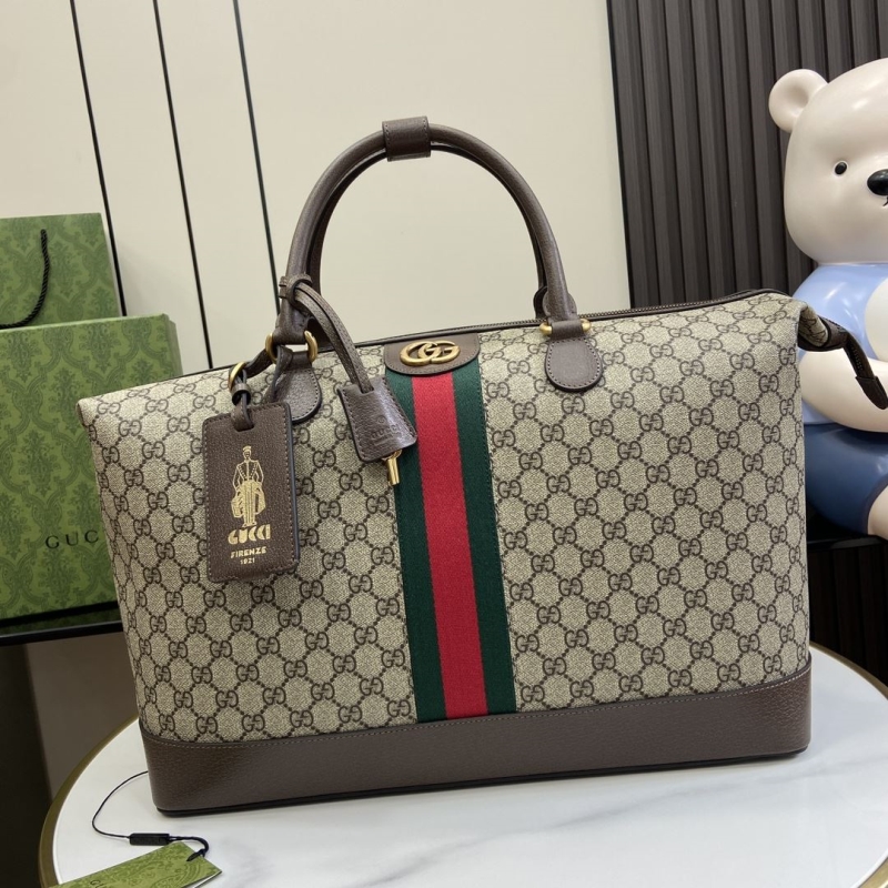 G*u*i top handle bags